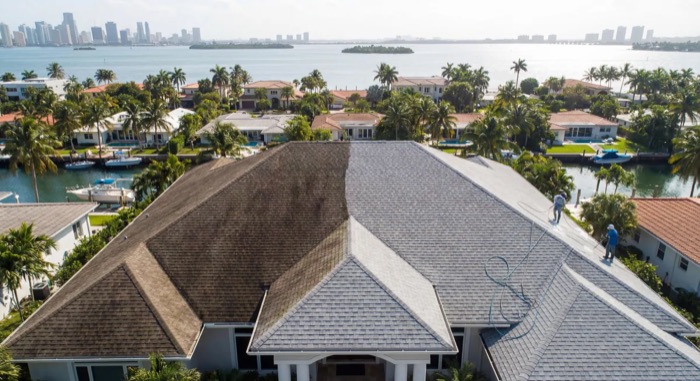 Low-pressure roof soft washing for tile and shingle roofs